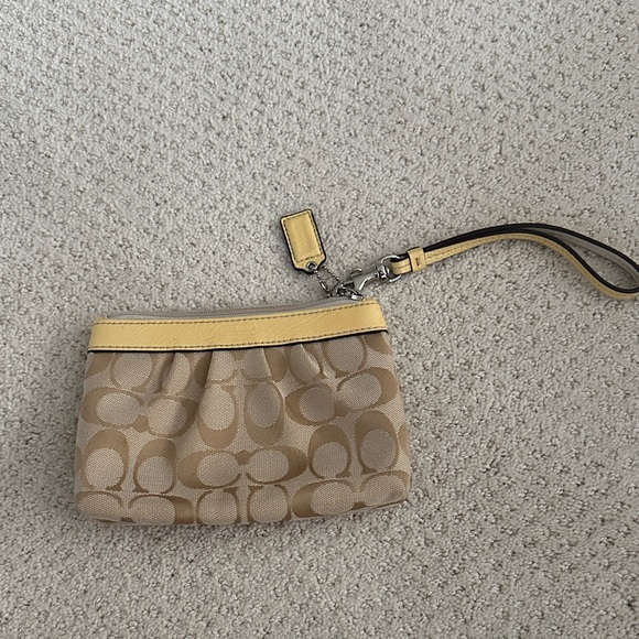 Coach Handbags - Coach Signature Tan and Yellow Wristlet